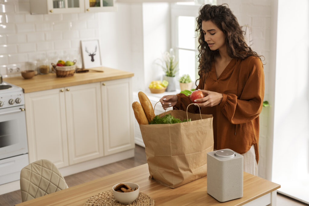 side view woman with groceries